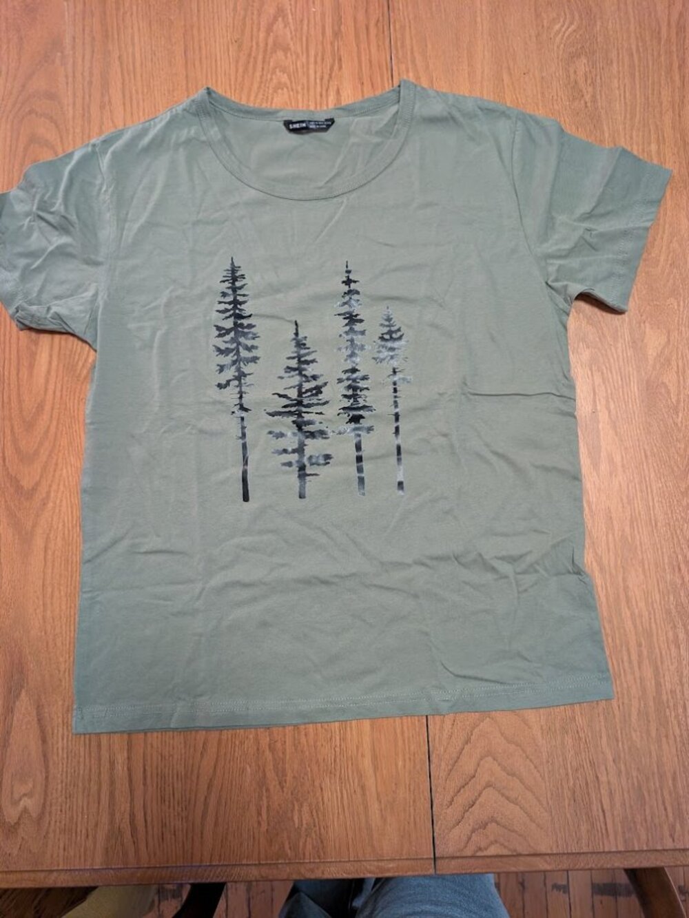 t-shirt with silhouette of trees